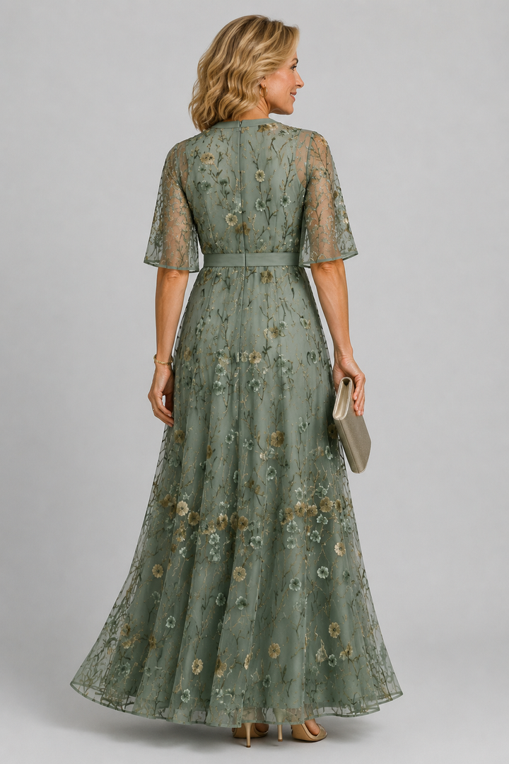 Solenne | Blomstret midikjole med halterneck