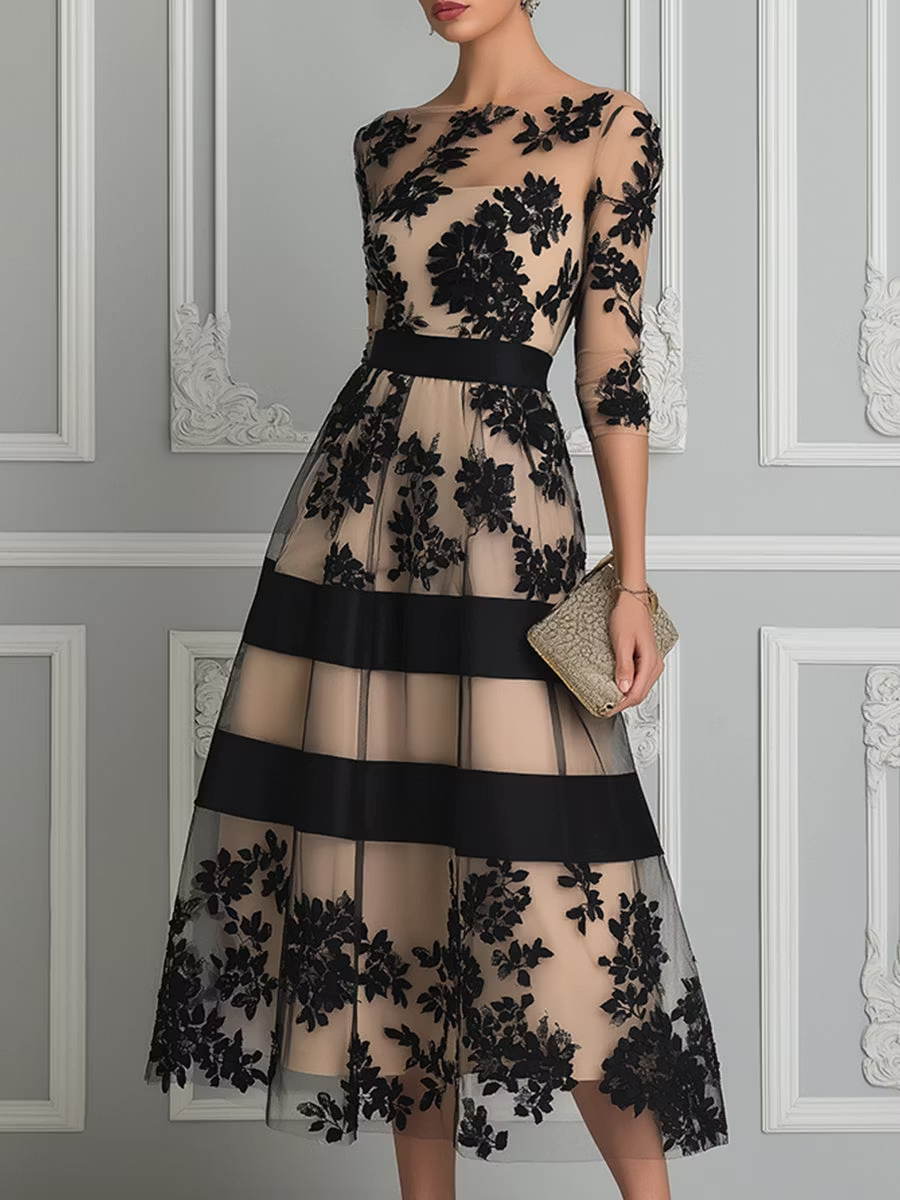 Elegant sort A-formet midikjole i blonde