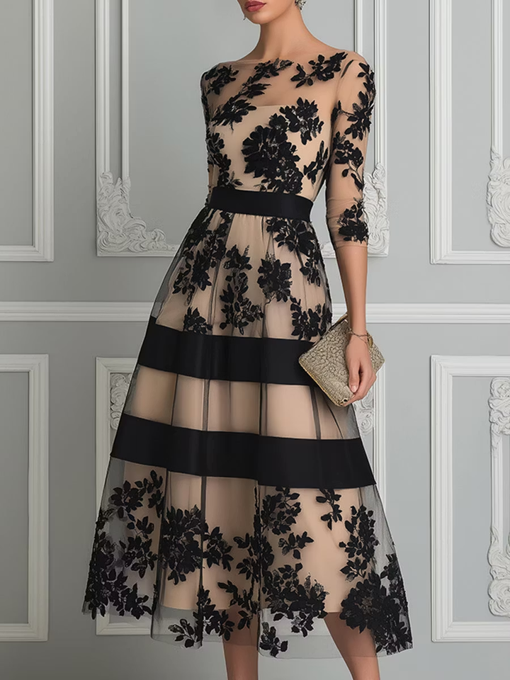 Elegant sort A-formet midikjole i blonde