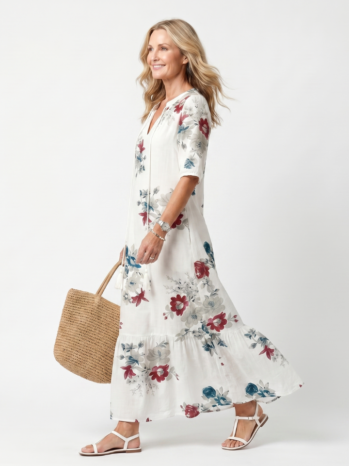 Maeva | Midikjole med spredt blomsterprint og kvastbånd