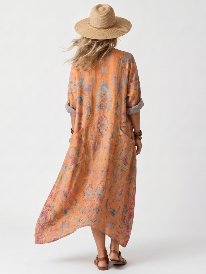 Remi | Midikjole med print, hakudskæring og oversize lommer