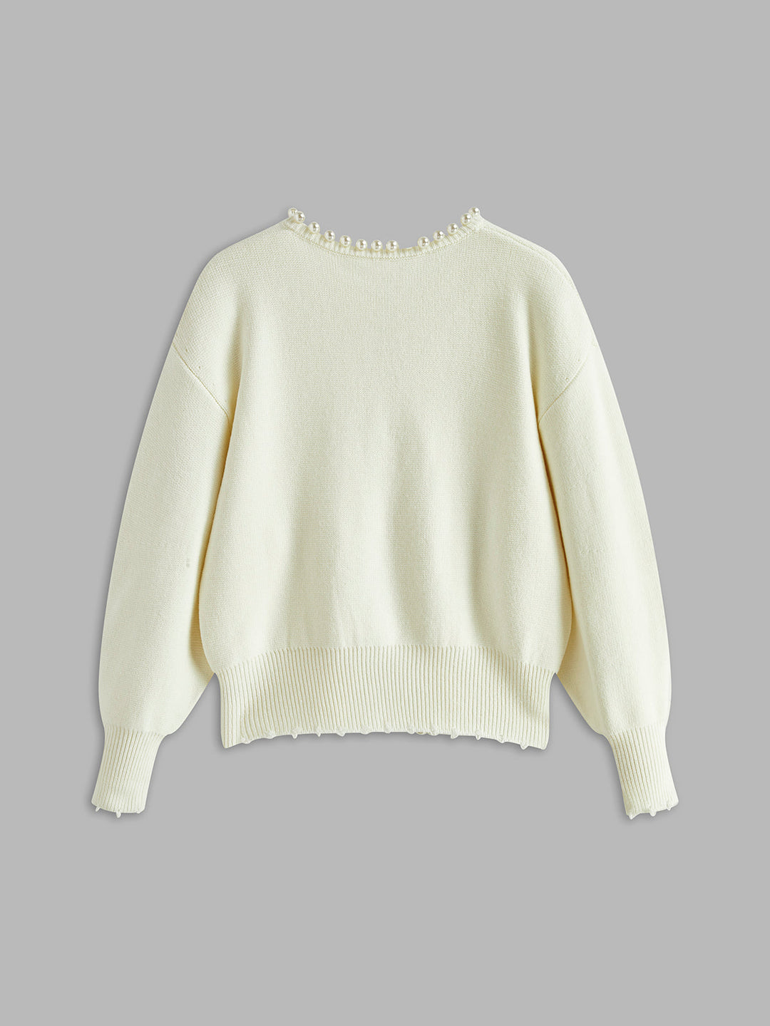Cardigan med perlekant