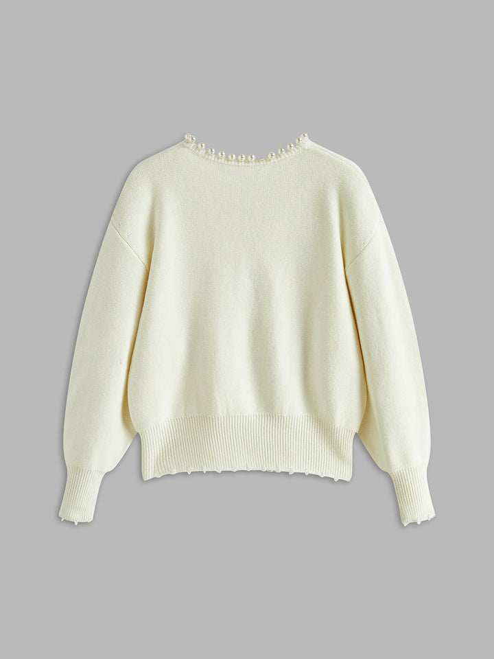 Cardigan med perlekant