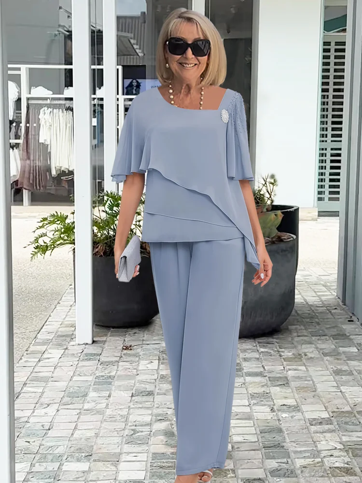 Ninon | Sæt med asymmetrisk lagdelt bluse og vide bukser