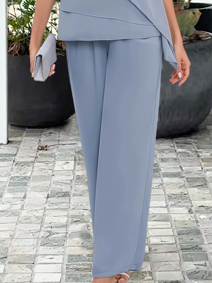 Ninon | Sæt med asymmetrisk lagdelt bluse og vide bukser