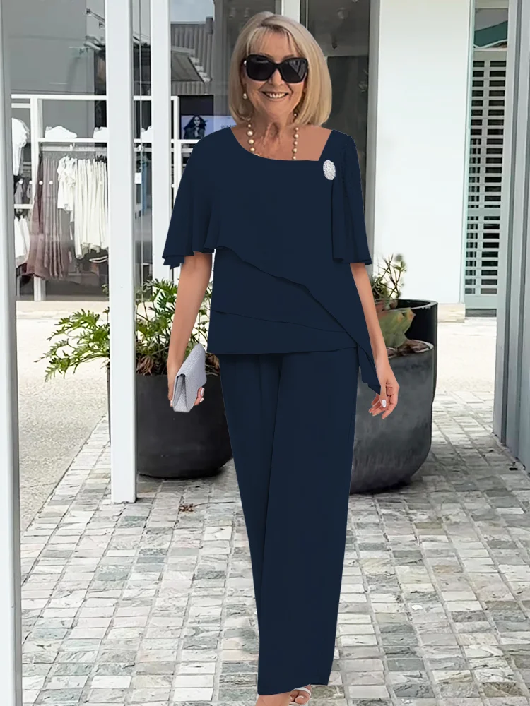 Ninon | Sæt med asymmetrisk lagdelt bluse og vide bukser