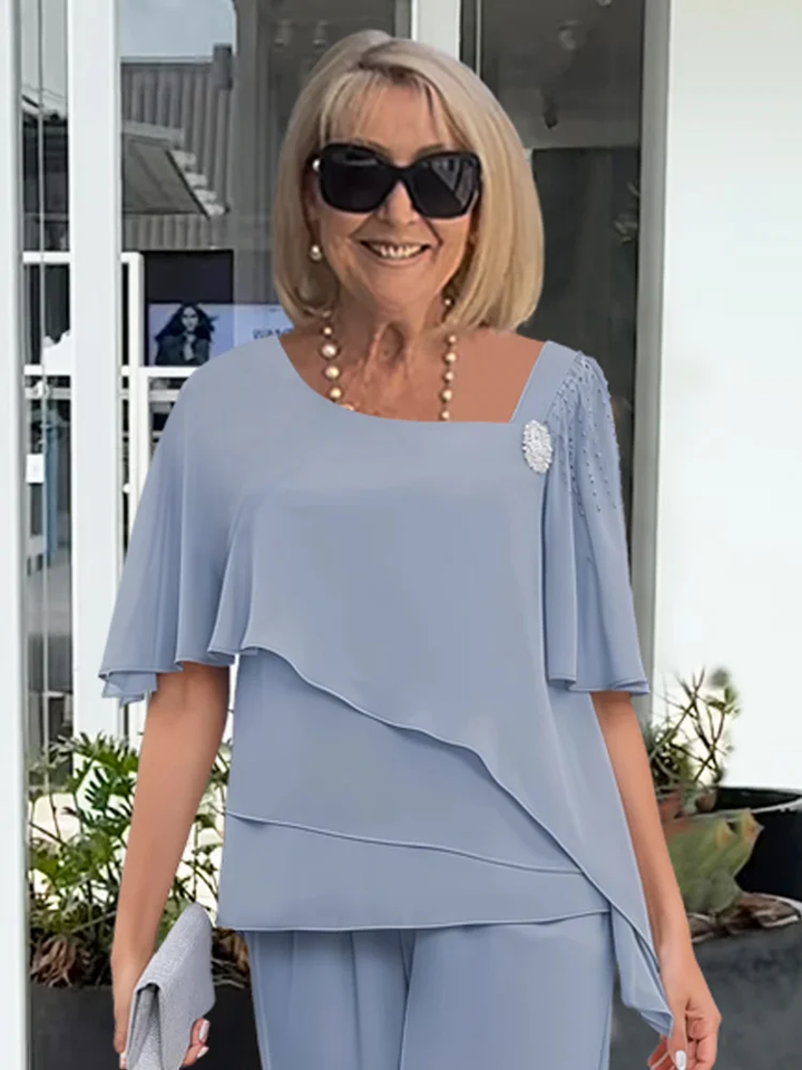 Ninon | Sæt med asymmetrisk lagdelt bluse og vide bukser