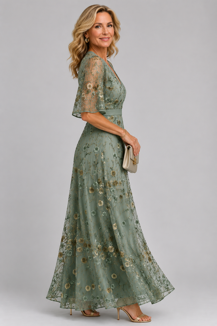 Solenne | Blomstret midikjole med halterneck